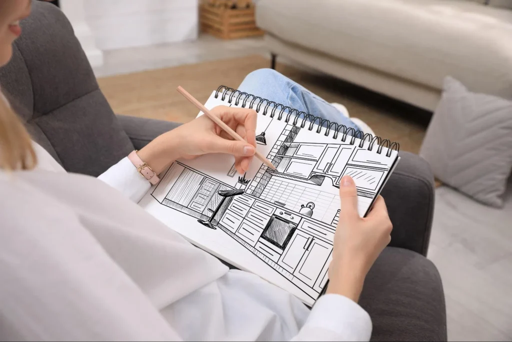注文住宅のおしゃれな内装を実現させるために、考えたイメージを書き出している様子